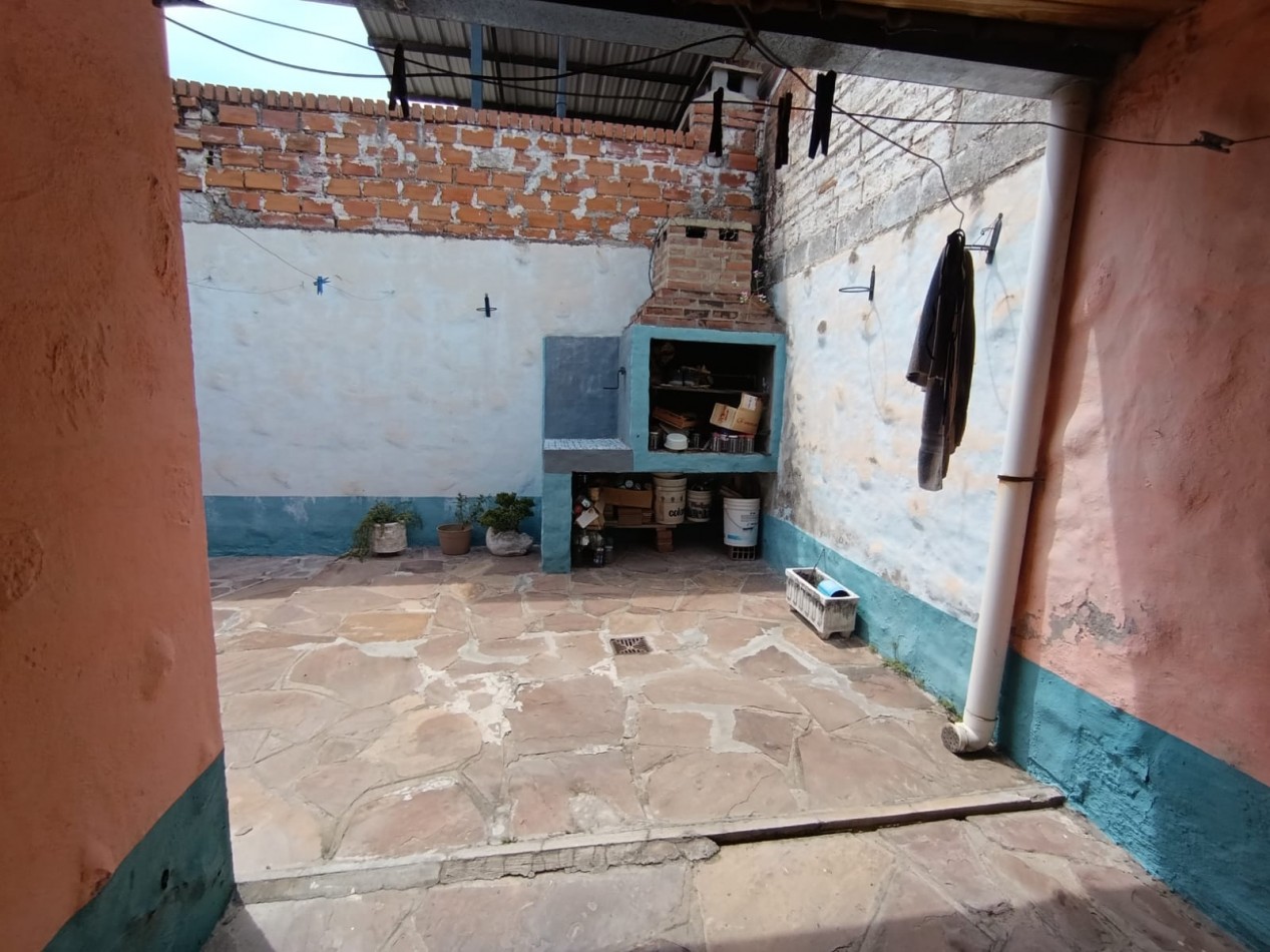 Tu nuevo hogar en Barrio San Pedrito: Espacio, comodidad y asador propio. Casa tres dormitorios en 530 viviendas sobre pasaje 9 del barrio San Pedrito. 